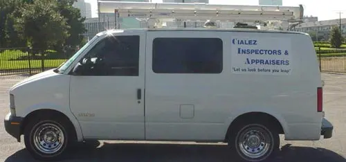 A white van with the words college of interior and exterior arts on it.
